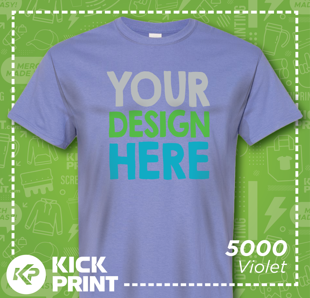 A violet t-shirt made of soft cotton with the words YOUR DESIGN HERE printed in gray, green, and blue text. The image highlights Kick Print branding, the 5000 Violet label, and shows the difference in print detail on quality fabrics.