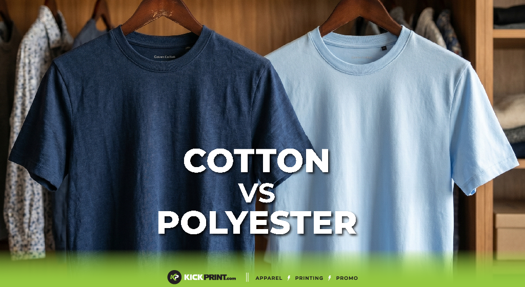 Two plain t-shirts, one dark blue Cotton and one light blue Polyester, hang on wooden hangers in a closet, highlighting the difference. The text COTTON VS POLYESTER is centered over the shirts.