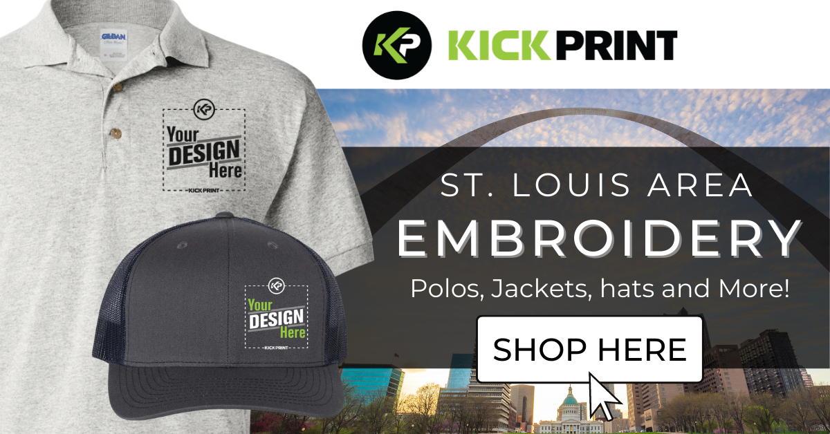 Showcasing KickPrint embroidery in St. Louis, this ad rivals top Screen Printing Companies Missouri offers. Featuring a gray polo and dark cap with "Your Design Here" text, plus a Shop Here button over a cityscape backdrop.