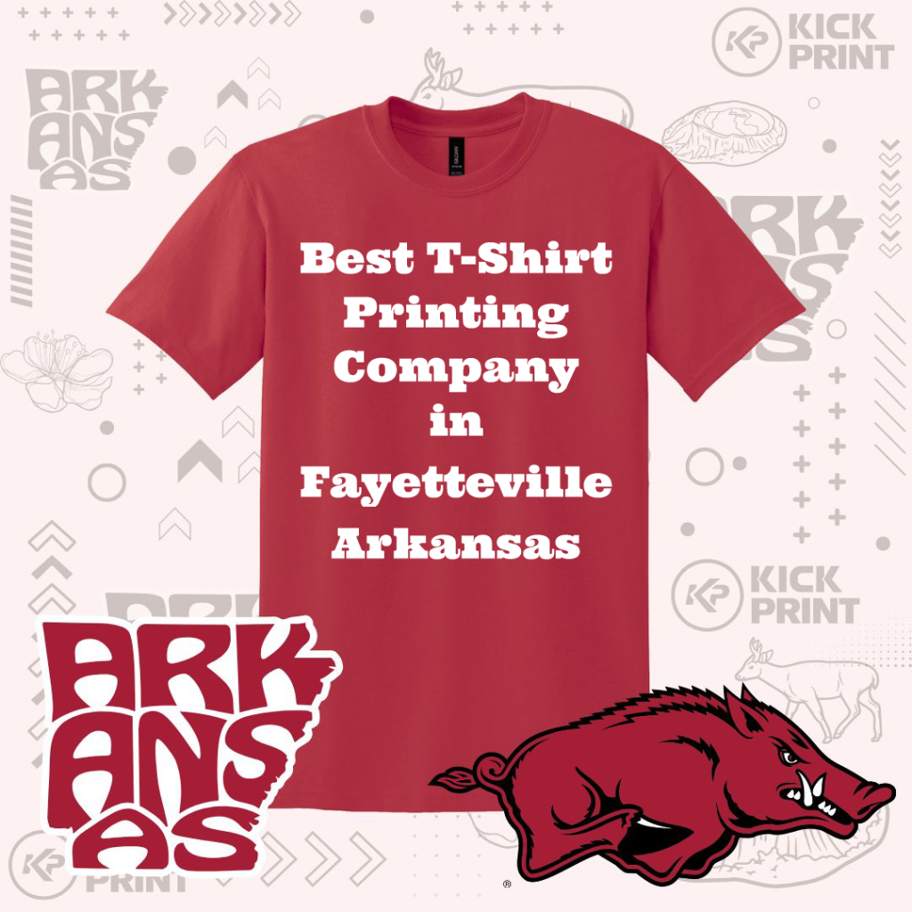 A red T-shirt with bold white text reading Best T-Shirt Printing Company in Fayetteville Arkansas. Surrounding graphics include the word ARKANSAS, a razorback hog logo, and various design elements in gray and red.