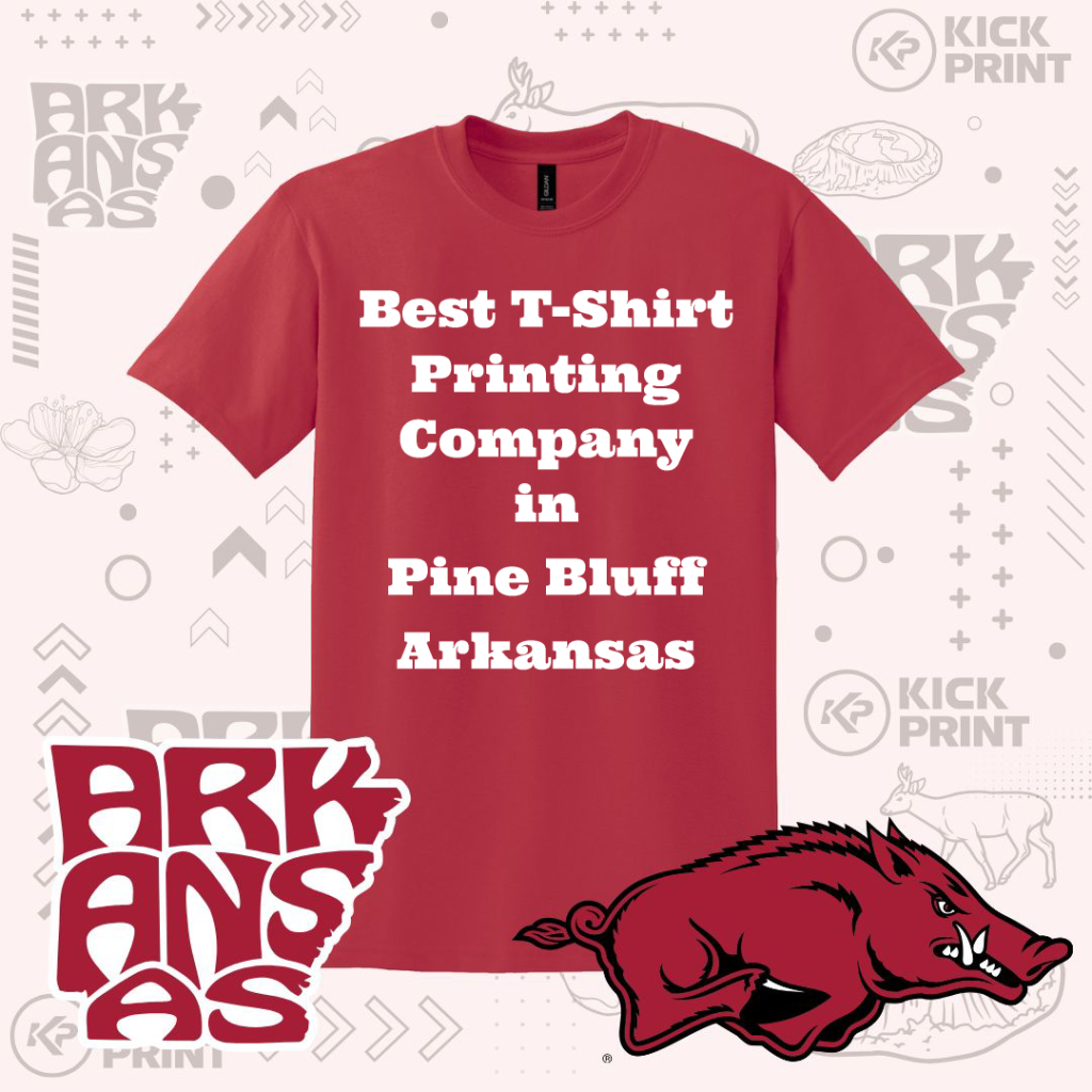 A red T-shirt with white bold text reads, Best T-Shirt Printing Company in Pine Bluff Arkansas. Background includes Arkansas-themed graphics and a red razorback hog mascot.