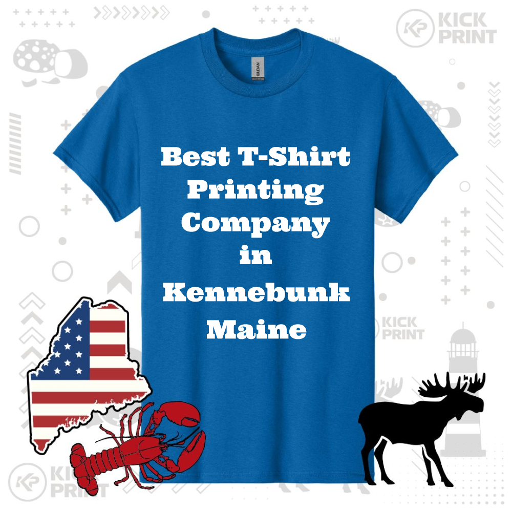 Blue t-shirt with bold white text that reads, Best T-Shirt Printing Company in Kennebunk Maine, surrounded by Maine-themed graphics: a lobster, moose, and a Maine state outline with an American flag pattern.