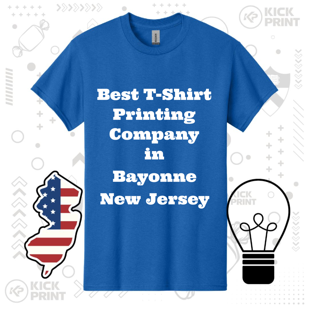 A blue t-shirt displays the bold white text: Best T-Shirt Printing Company in Bayonne New Jersey. The background features a New Jersey state outline with an American flag pattern and a lightbulb icon.