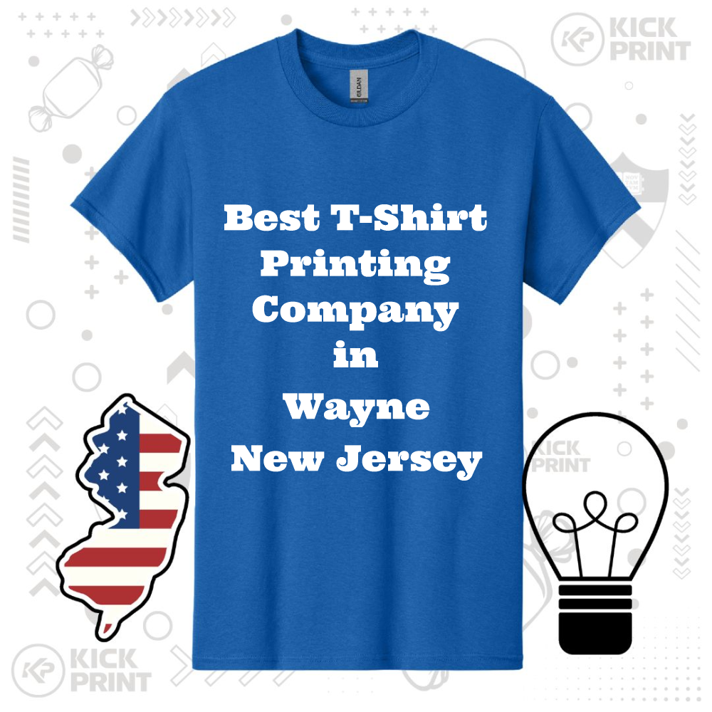 Blue t-shirt with the white text “Best T-Shirt Printing Company in Wayne New Jersey,” displayed with an outline of New Jersey filled with a US flag and a black lightbulb graphic nearby.