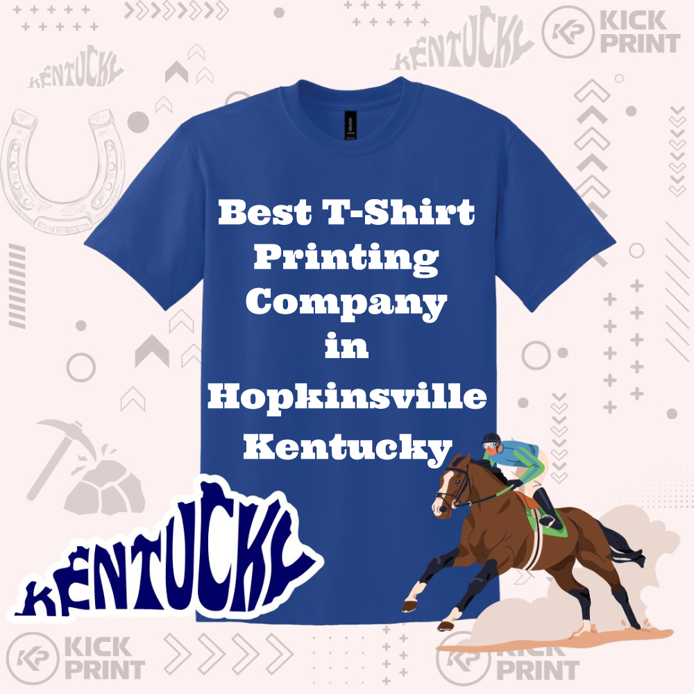 A blue T-shirt reads Best T-Shirt Printing Company in Hopkinsville Kentucky in bold white letters, with Kentucky-themed graphics, a jockey on a racehorse, and the word Kentucky stylized below.