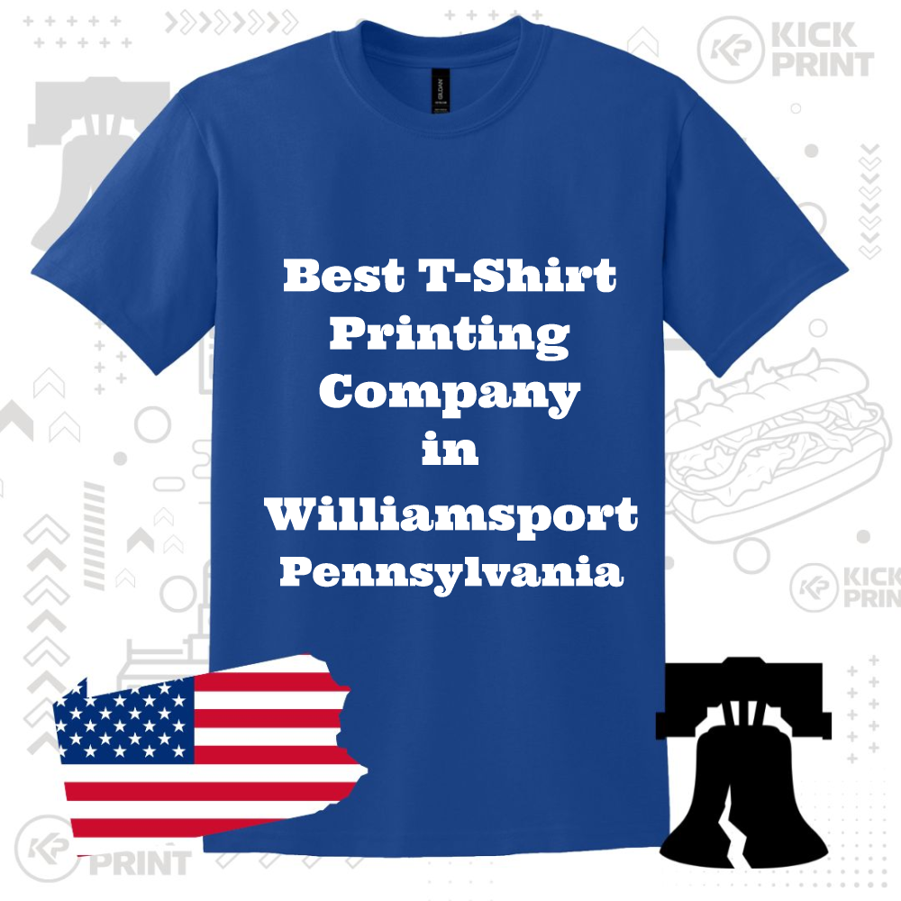 A royal blue t-shirt with bold white text reading Best T-Shirt Printing Company in Williamsport Pennsylvania, surrounded by graphics of the U.S. flag, Liberty Bell, and a sandwich.