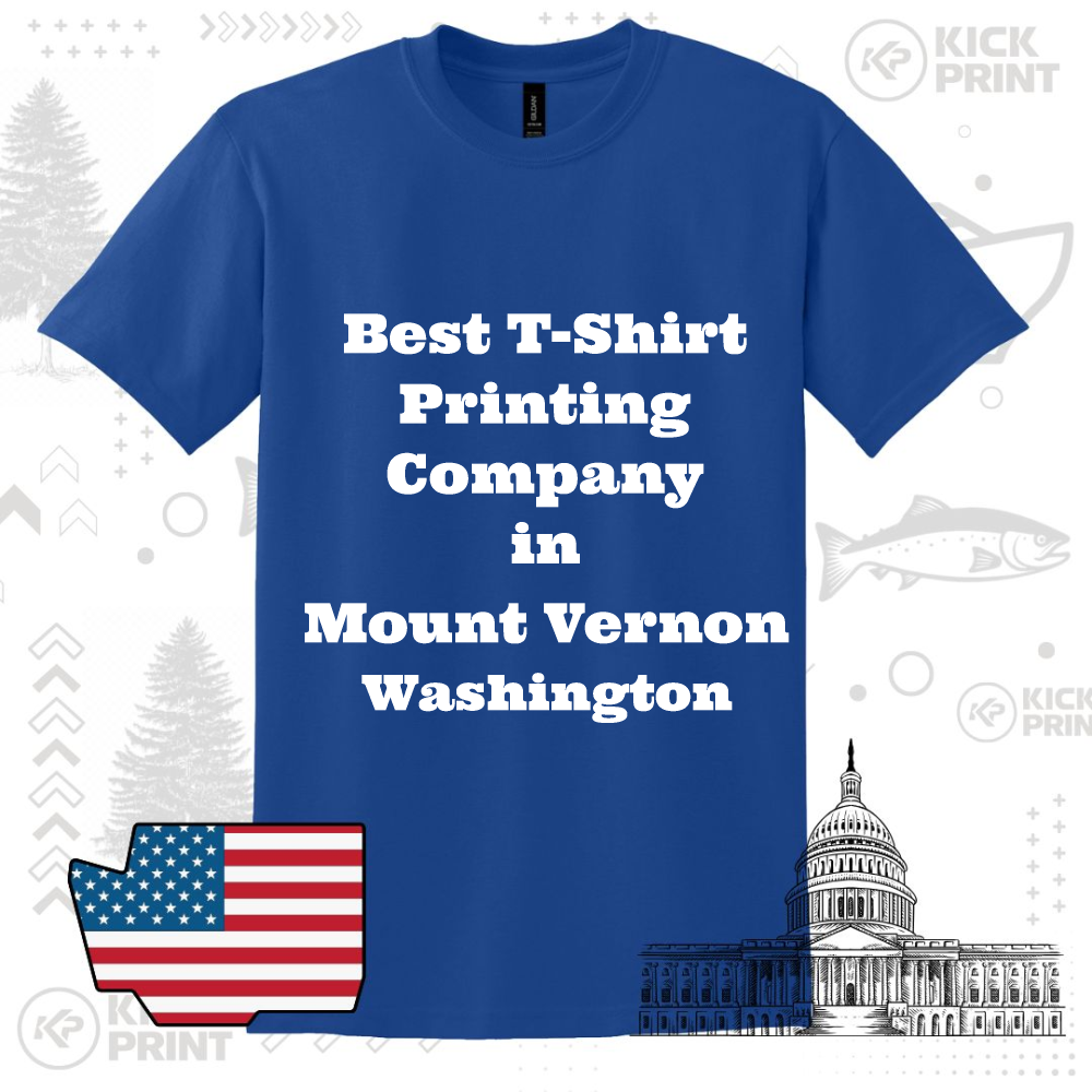 A blue t-shirt with bold white text reading Best T-Shirt Printing Company in Mount Vernon Washington, set against a background featuring an American flag, the U.S. Capitol, and decorative graphics.
