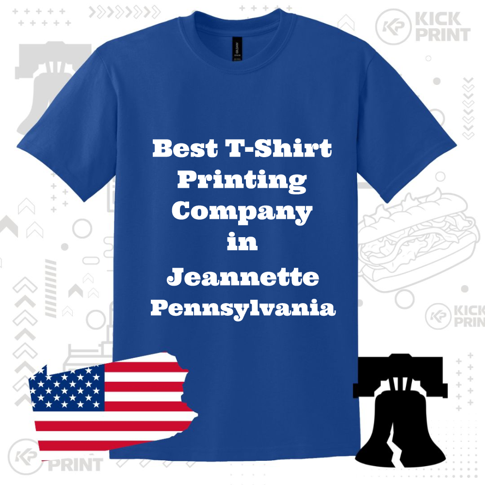 A blue t-shirt with white bold text reading Best T-Shirt Printing Company in Jeannette Pennsylvania, displayed on a patterned background with an American flag, Liberty Bell, and Pennsylvania state outline.
