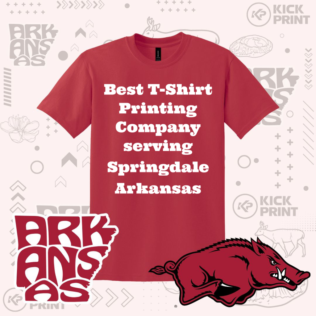 A red t-shirt with bold white text reading, Best T-Shirt Printing Company serving Springdale Arkansas. The background features Arkansas-themed graphics and logos, including a hog mascot and the word ARKANSAS.