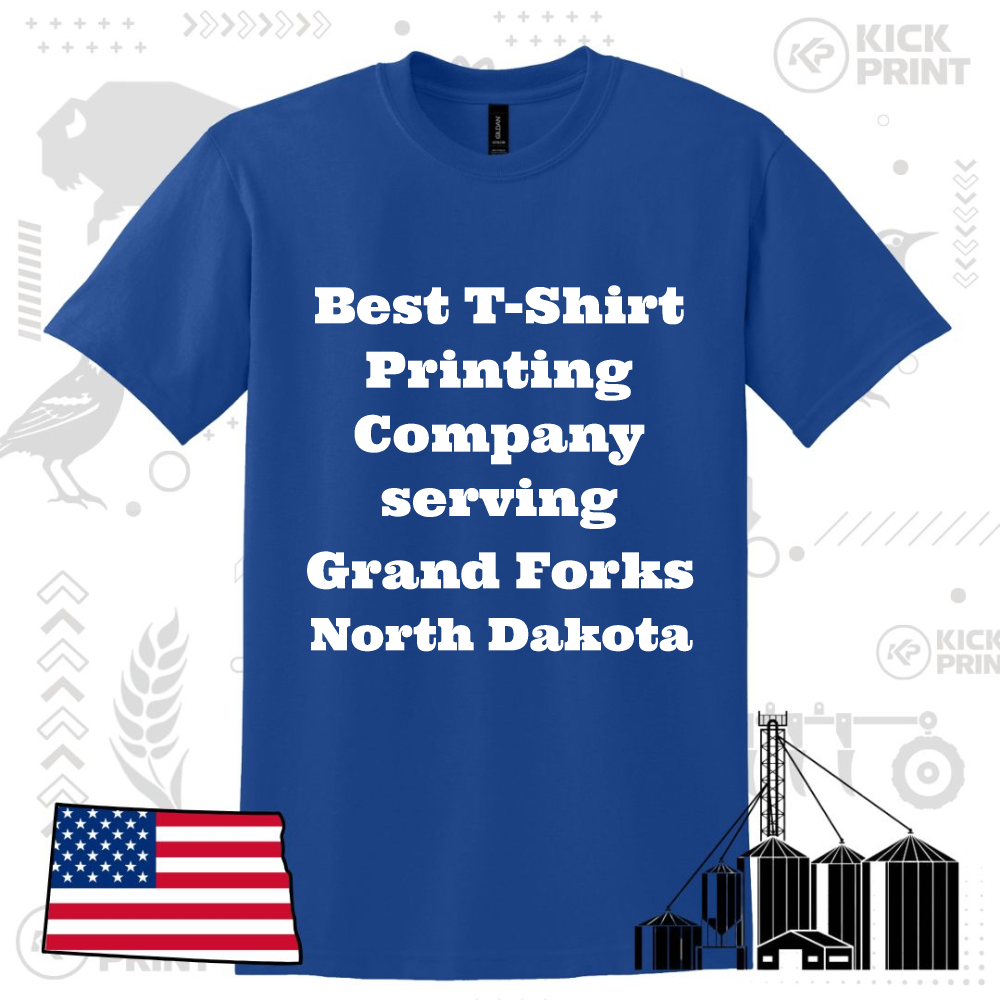 A blue t-shirt with bold white text that reads: Best T-Shirt Printing Company serving Grand Forks North Dakota. Behind the shirt are graphic elements, including a U.S. flag and silhouettes of silos and a state outline.