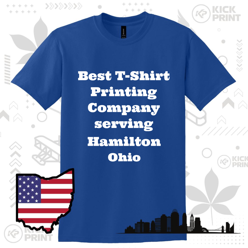 A blue t-shirt with bold white text that reads: “Best T-Shirt Printing Company serving Hamilton Ohio.” The background includes a silhouette of a city, a US flag inside an Ohio state outline, and graphic icons.