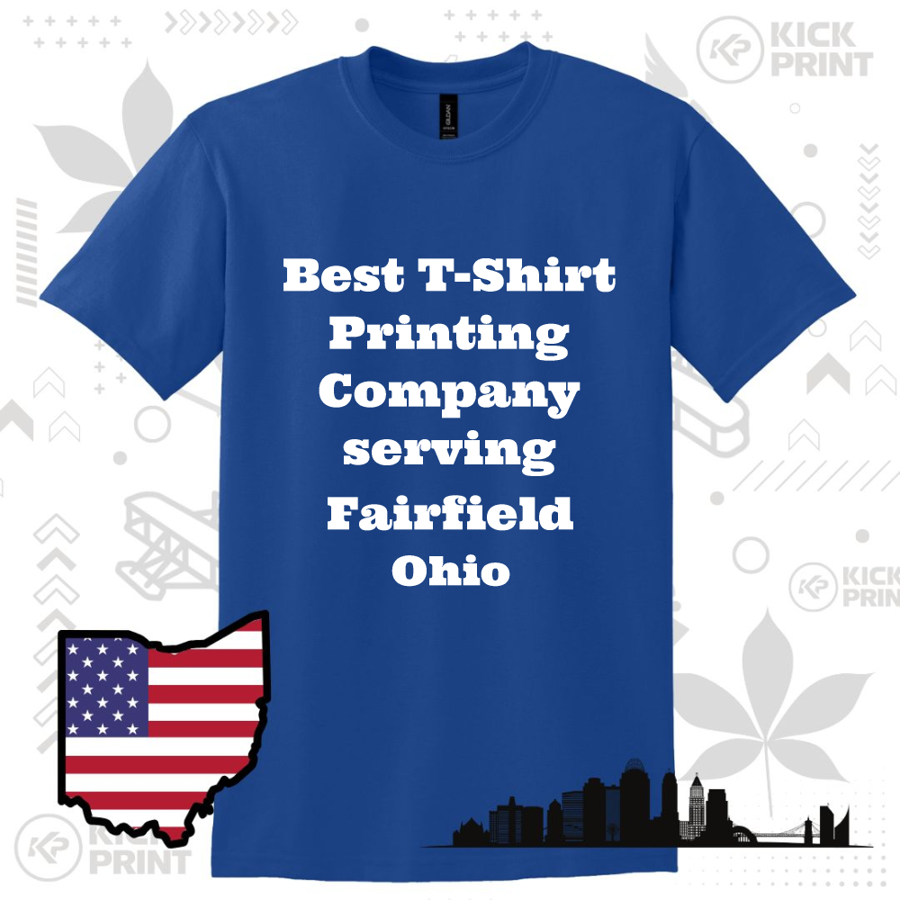 A blue T-shirt with white text reading Best T-Shirt Printing Company serving Fairfield Ohio, displayed on a graphic background with an outline of Ohio featuring an American flag and a city skyline silhouette.