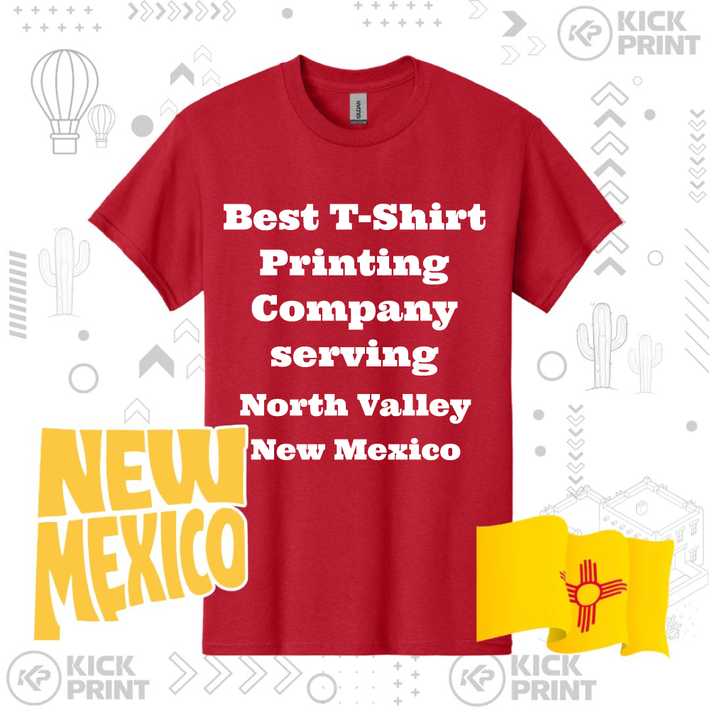 A red T-shirt with the text Best T-Shirt Printing Company serving North Valley New Mexico, surrounded by a yellow New Mexico graphic and the New Mexico state flag. Background features cacti and geometric designs.